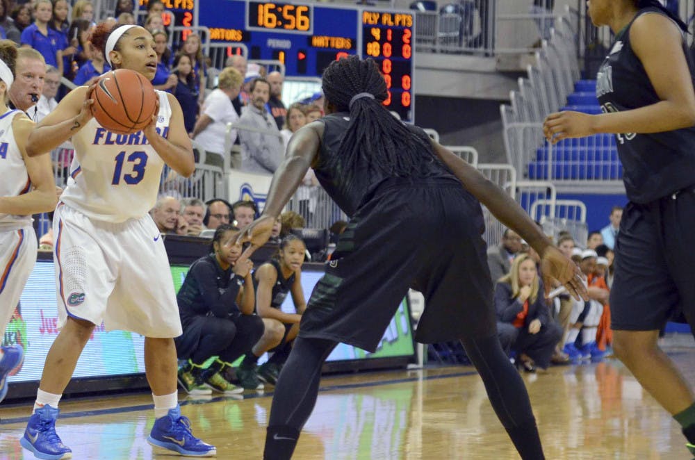 <p>Cassie Peoples looks to pass the ball during Florida's win against Stetson on Dec. 14</p>