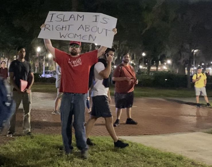 Brian Patrick Smith was outside University Auditorium Thursday night among among protestors who were protesting against Donald Trump Jr. and Kimberly Guilfoyle's speech. Richard Tate was arrested after taking Smith's "Make America Great Again" cap.
&nbsp;