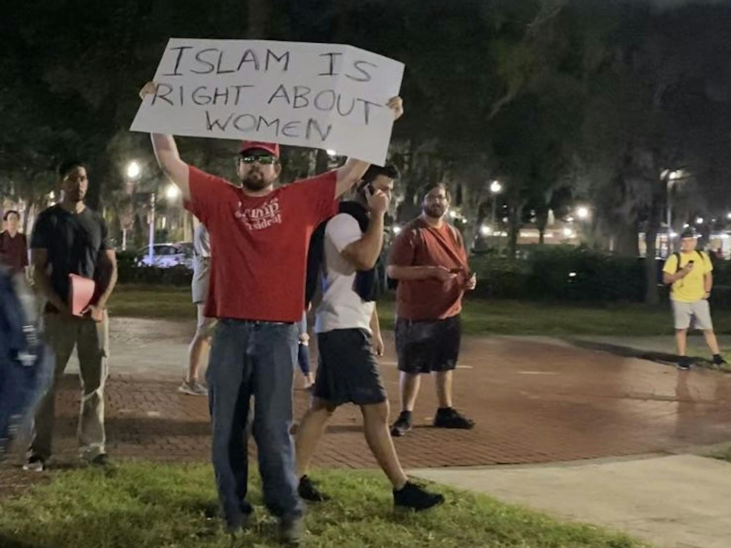 Brian Patrick Smith was outside University Auditorium Thursday night among among protestors who were protesting against Donald Trump Jr. and Kimberly Guilfoyle's speech. Richard Tate was arrested after taking Smith's "Make America Great Again" cap.
