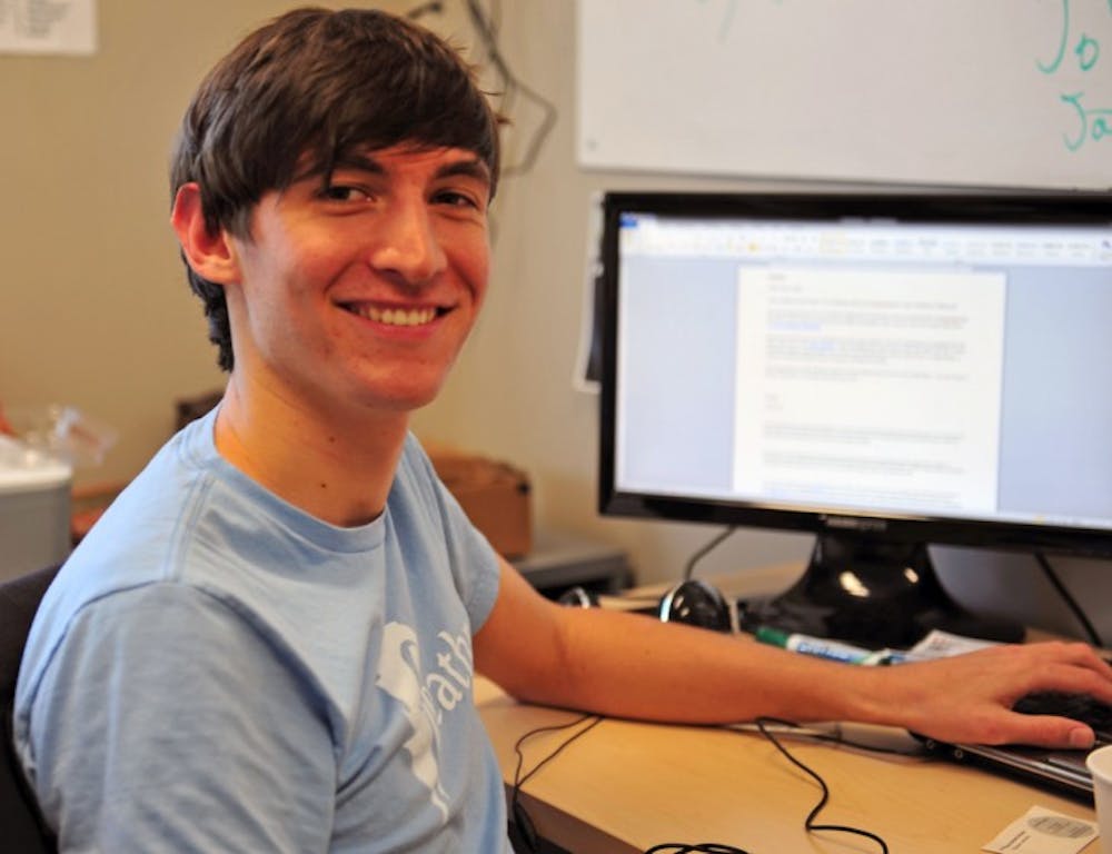 <p>Aidan Augustin, a 21-year-old industrial engineering senior, is hard at work at the Feathr office, located in the UF Innovation Hub. The Feathr team is the only student company currently occupying the building.</p>