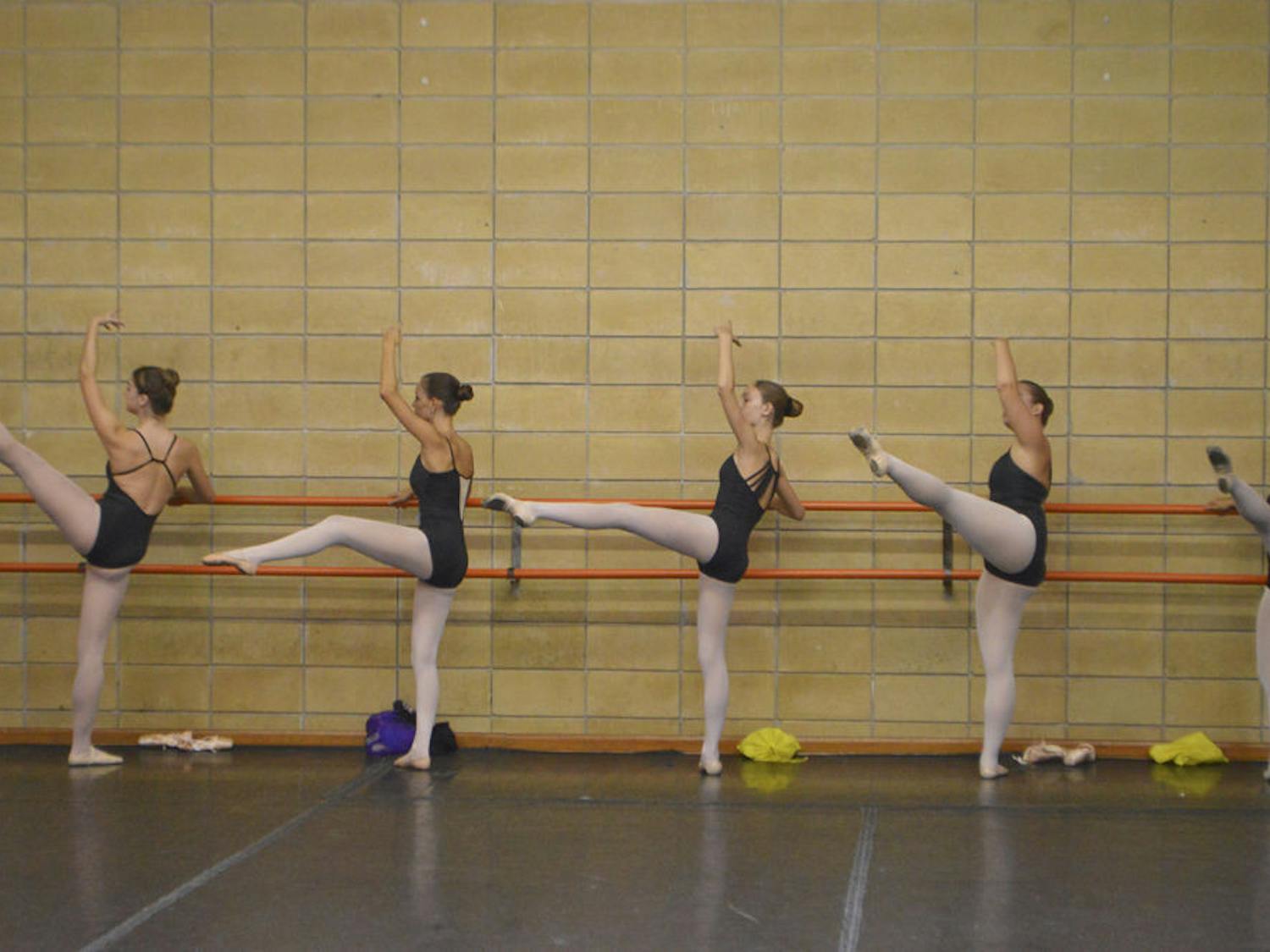 TINY DANCERS -- Ballerinas practice barre work at Pofhal Studios during the studio's Fall auditions. The auditions were for many shows throughout the semester, including the Nutcracker.