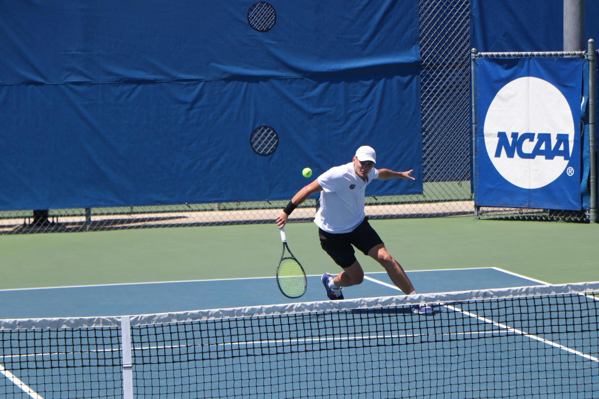 Florida&#x27;s Sam Riffice returns a ball against South Florida on May 9, 2021. 