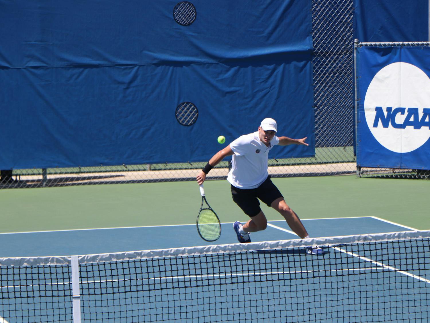Florida&#x27;s Sam Riffice returns a ball against South Florida on May 9th. Riffice advanced to the men&#x27;s semifinal at the individual championships in Orlando, Florida on Wednesday.