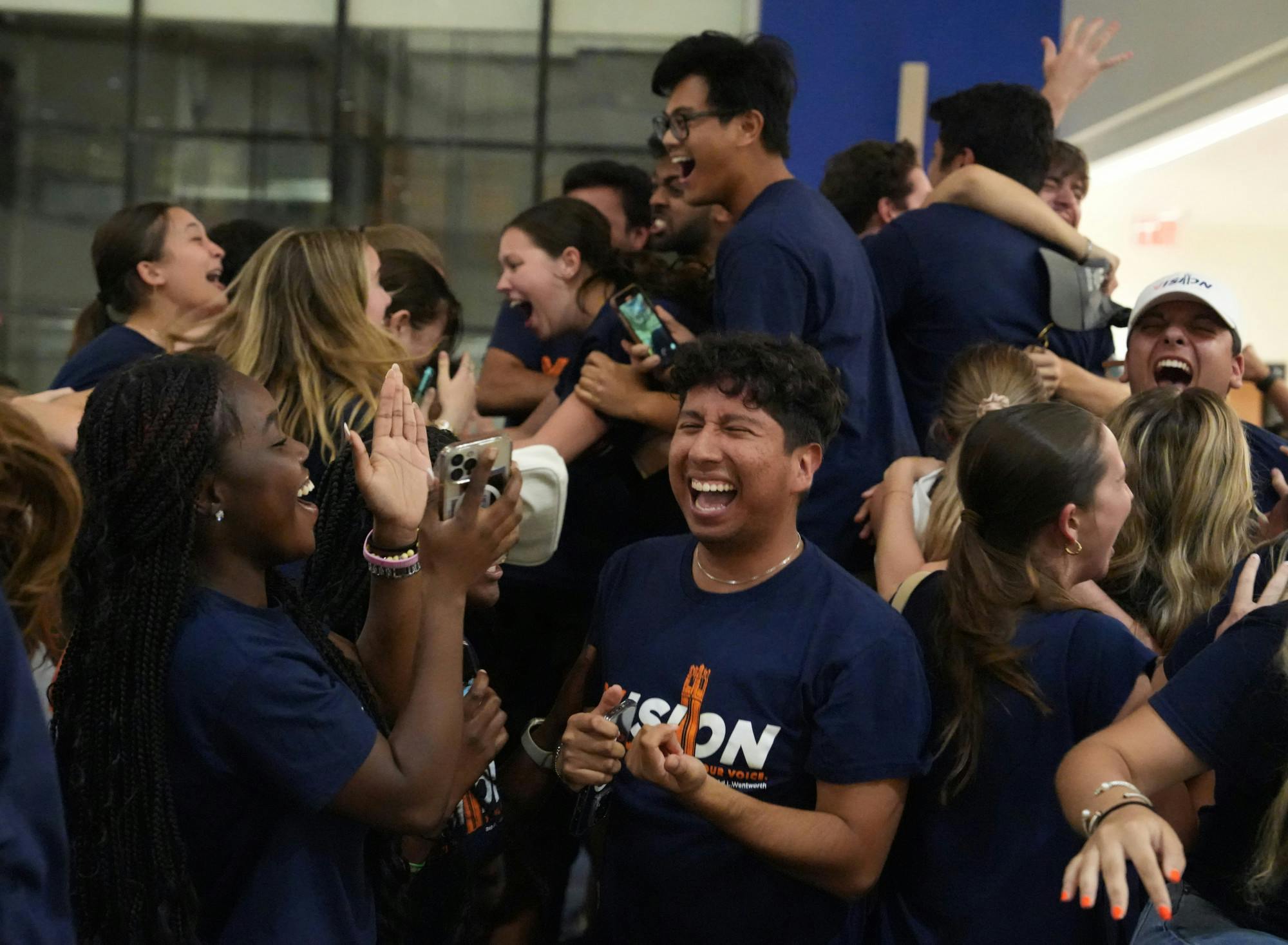Vision Party members joyously celebrate their election win on Wednesday, Oct. 4, 2023.