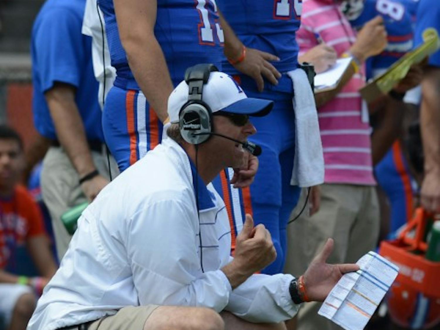Gators offensive coordinator Brent Pease watches the action during Florida's spring game on last April at Ben Hill Griffin Stadium. Although UF has run the ball 65.8 percent of the time this season, Pease has brought creativity to the offense from his previous job as offensive coordinator at Boise State.