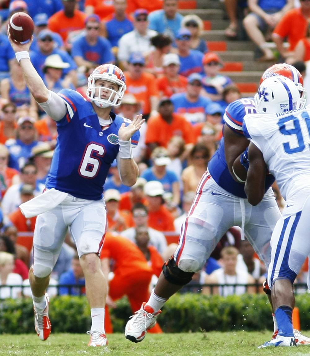 <p>Sophomore quarterback Jeff Driskel throws a completed pass during Florida's 38-0 win against Kentucky at Ben Hill Griffin Stadium on Saturday. Driskel finished 18-of-27 for 203 yards, two total touchdowns and an interception.</p>