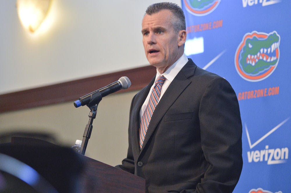 Coach Billy Donovan addresses media during the 2014 men's basketball team media day.