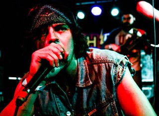 Taylor Johnson from Skunkape gets face-to-face with the crowd.