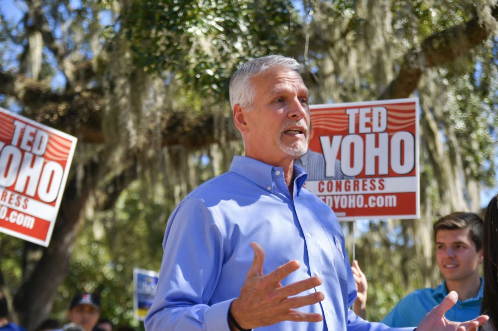 Senator Keith Perry speaks to rally attendees Tuesday afternoon at the Red Wave Rally in Turlington Plaza. Perry said, “Give me a call and we’ll discuss issues.” State Rep. Chuck Clemons and Congressman Ted Yoho also attended the event to interact with students and get them to vote.