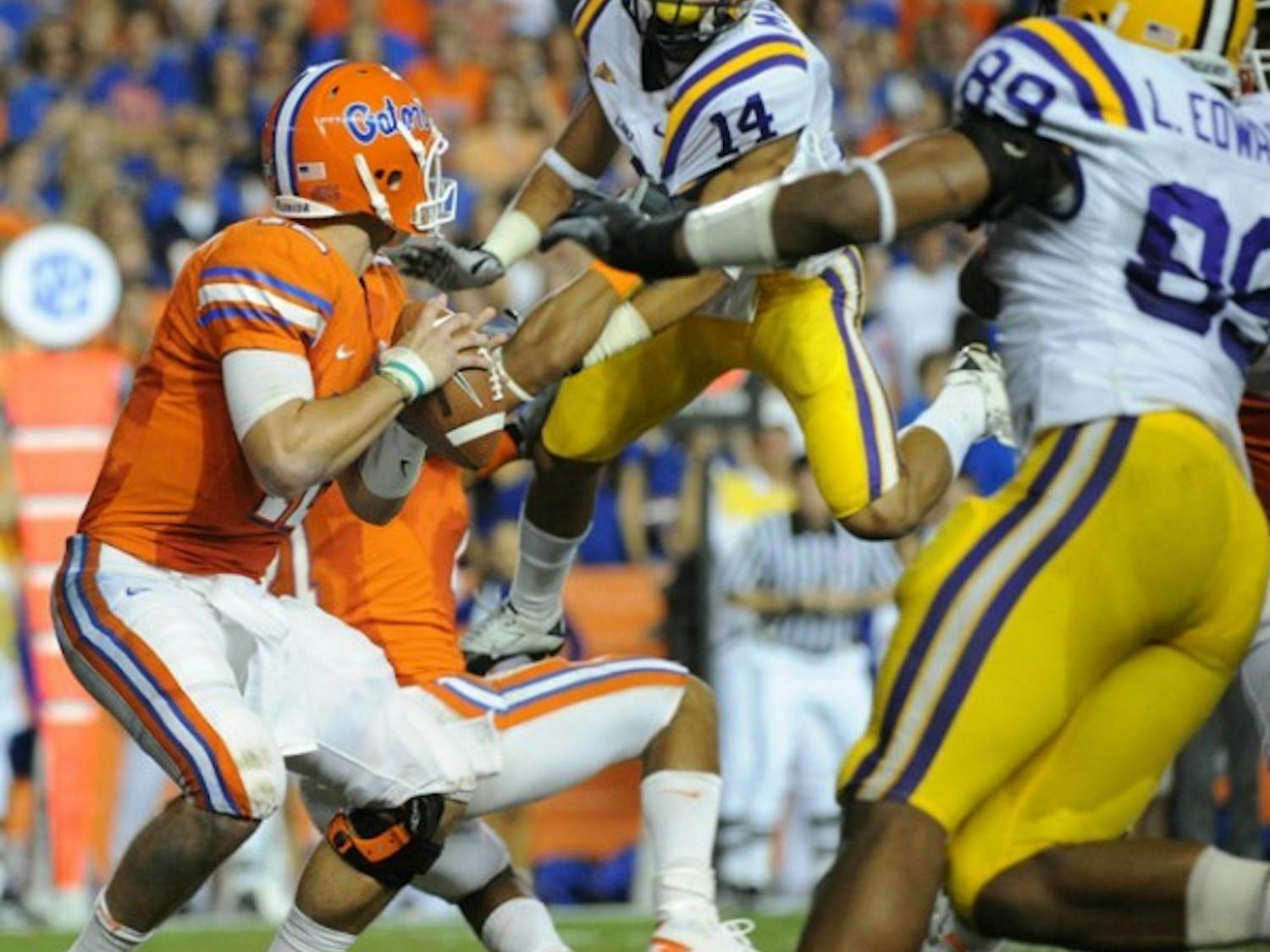 LSU cornerback Tyrann Mathieu (14) has forced four fumbles this season — the same number as Florida’s entire defense. Mathieu returned two of those fumbles for touchdowns.