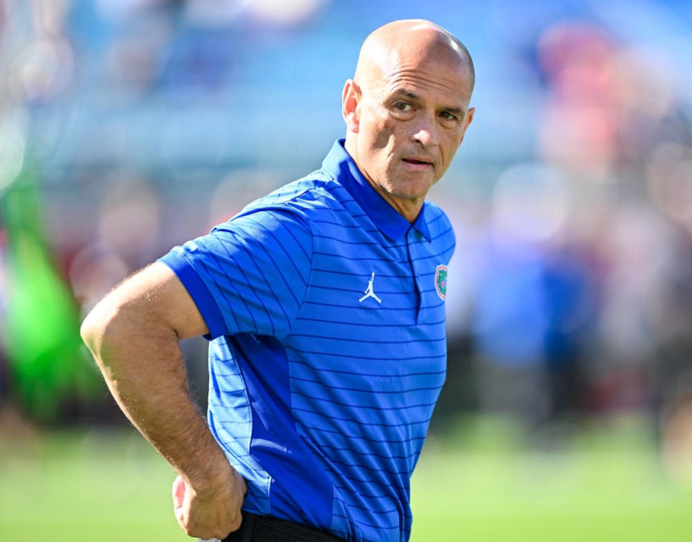 Florida head coach Billy Gonzales during warmups before a NCAA college football game, Saturday, Nov. 1, 2025, in Jacksonville, Fla.