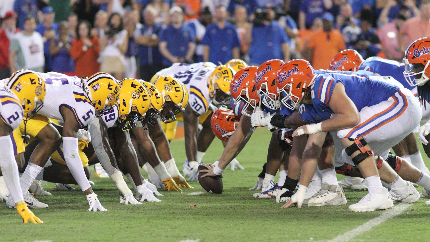 The Florida Gators' offensive line gets set against the LSU Tigers' defensive line in the Gators' 45-35 loss to the Tigers on Saturday, Oct. 15, 2022.
