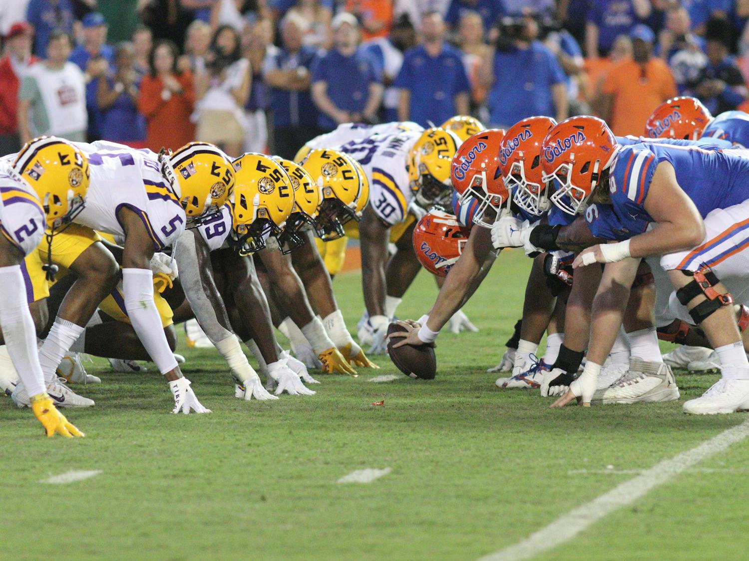 The Florida Gators' offensive line gets set against the LSU Tigers' defensive line in the Gators' 45-35 loss to the Tigers on Saturday, Oct. 15, 2022.