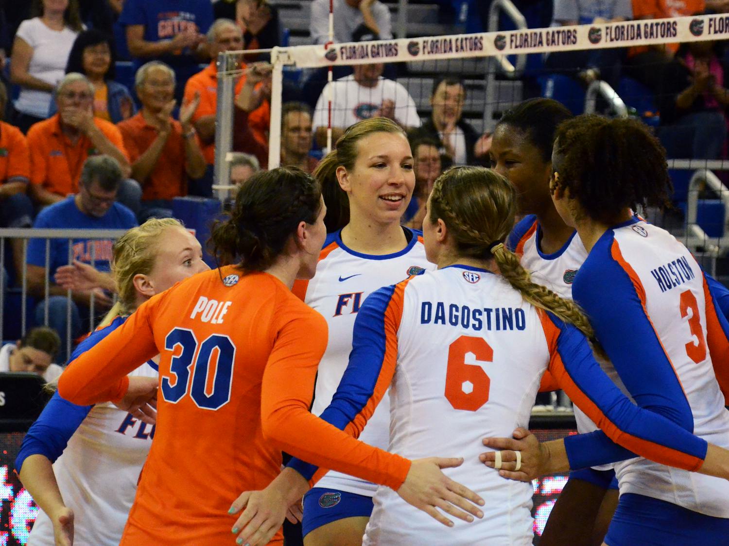 UF players celebrate after a point during Florida's 3-0 win against Missouri on Friday in the O'Connell Center.