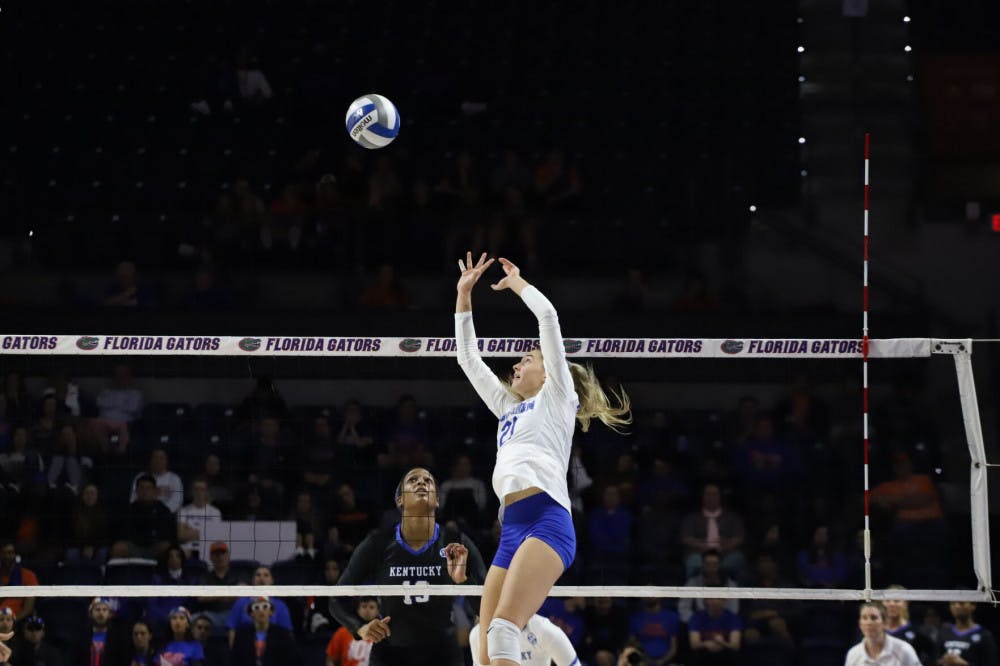 Now-junior Marlie Monserez sets for the Gators at last year&#x27;s home match versus Kentucky. The setter reached a career-high in kills Friday against Tennessee