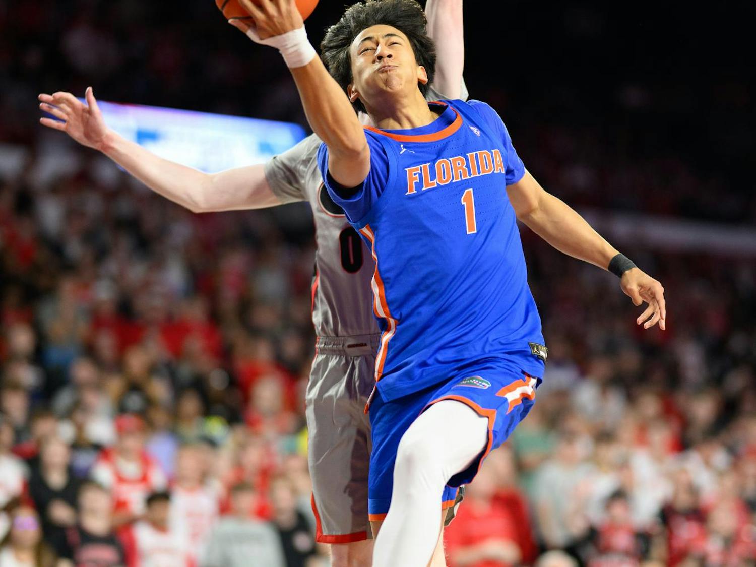 Florida guard Xaivian Lee (1) shoots a layup during the first half of an NCAA college basketball game against Georgia, Wednesday, Feb. 11, 2026, in Athens, Ga.