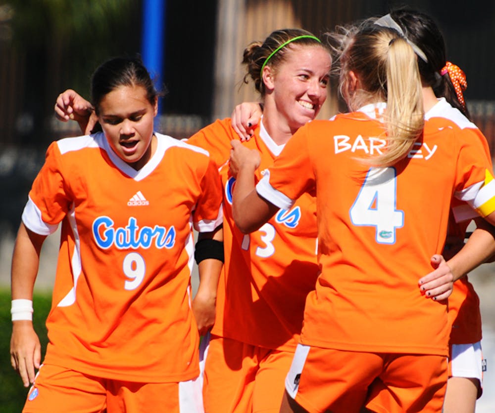 <p>Florida sophomore forward Annie Speese (center) tied the Gators' game against New Mexico on Sept. 9 with a right-footed kick in the 50th minute. Speese tore her right ACL during Florida's loss in the second round of the NCAA Tournament last season.</p>