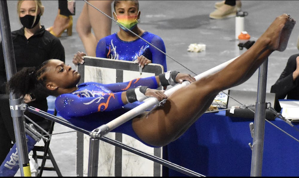 <p>Trinity Thomas performs on the bars Jan. 29 vs Missouri. The junior standout returned from a six-week absence to lead Florida into the national championship</p>