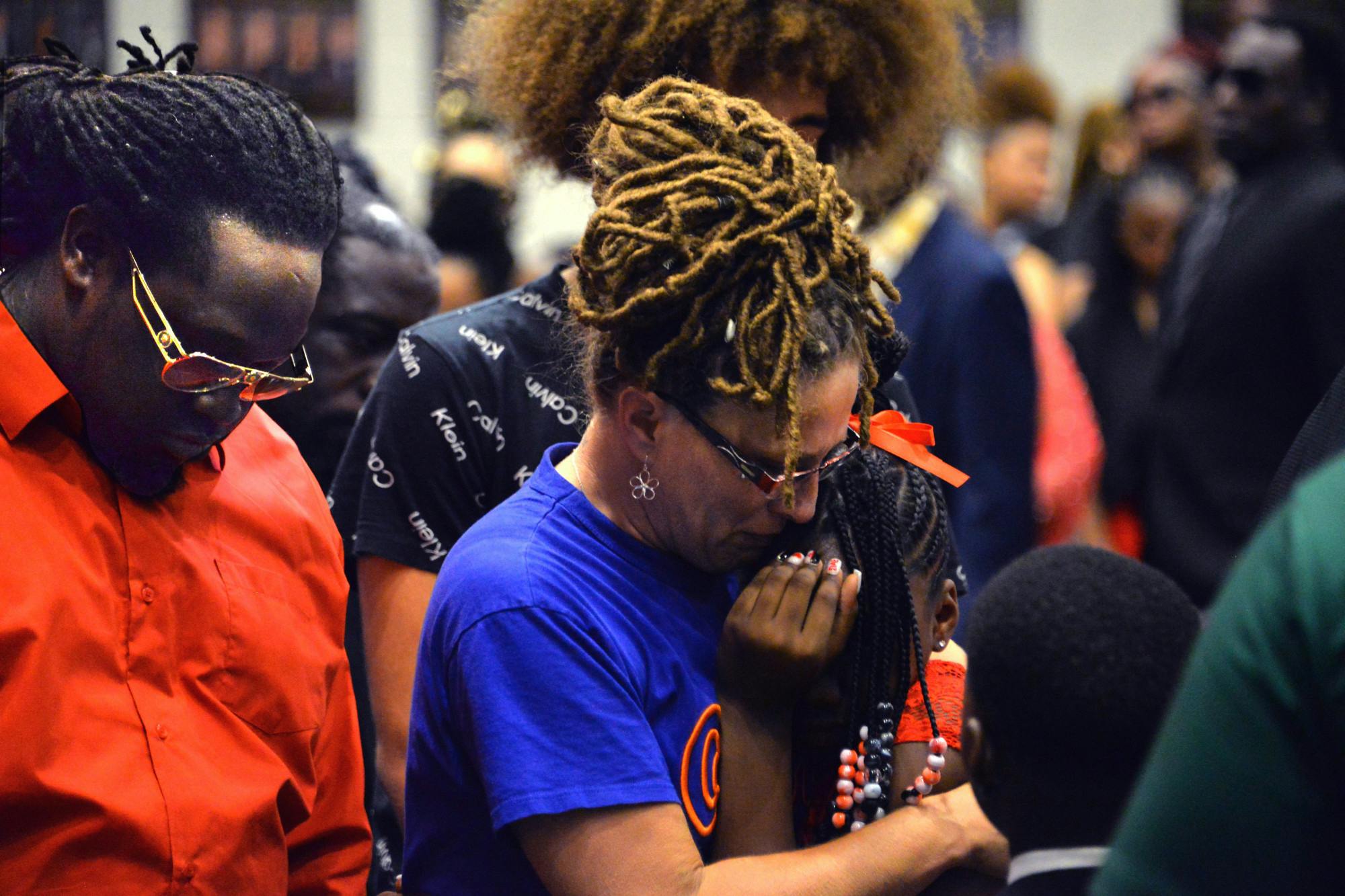 Eastside High School community members mourn in honor of Dabien White Saturday, Sept. 17, 2022. Dabien White died on Sept. 4, 2022. 