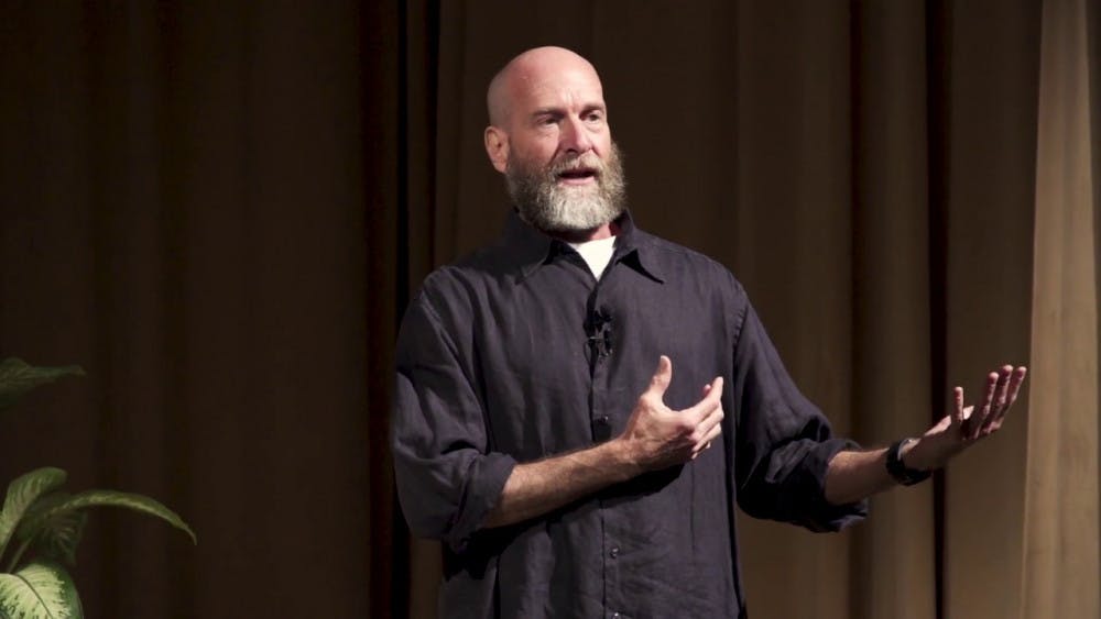 David Deida captivating his audience at an event in Los Angeles