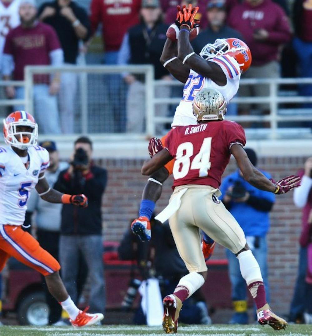 <p>Safety Matt Elam intercepts a pass thrown by EJ Manuel during Florida’s 37-26 win against Florida State on Saturday at Doak Campbell Stadium in Tallahassee.</p>
<div>&nbsp;</div>
<p>&nbsp;</p>