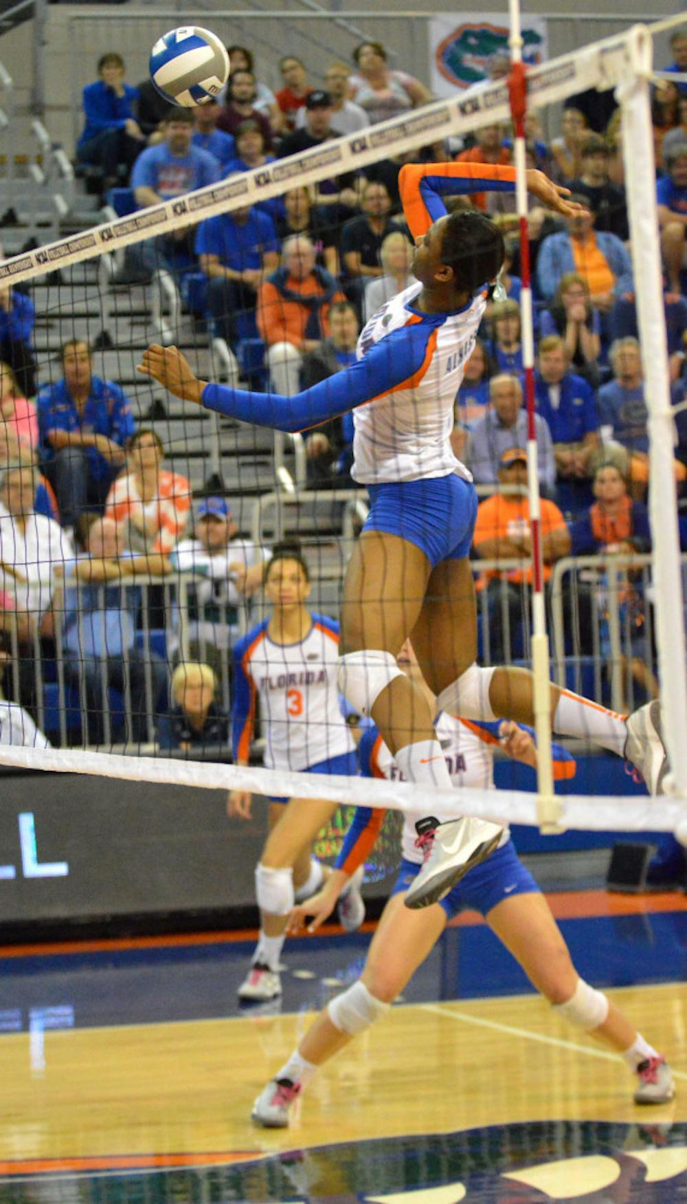<p>Rhamat Alhassan swings for a kill attempt during Florida's 3-0 win against Alabama State in the first round of the NCAA Tournament on Dec. 5 in the O'Connell Center.</p>
