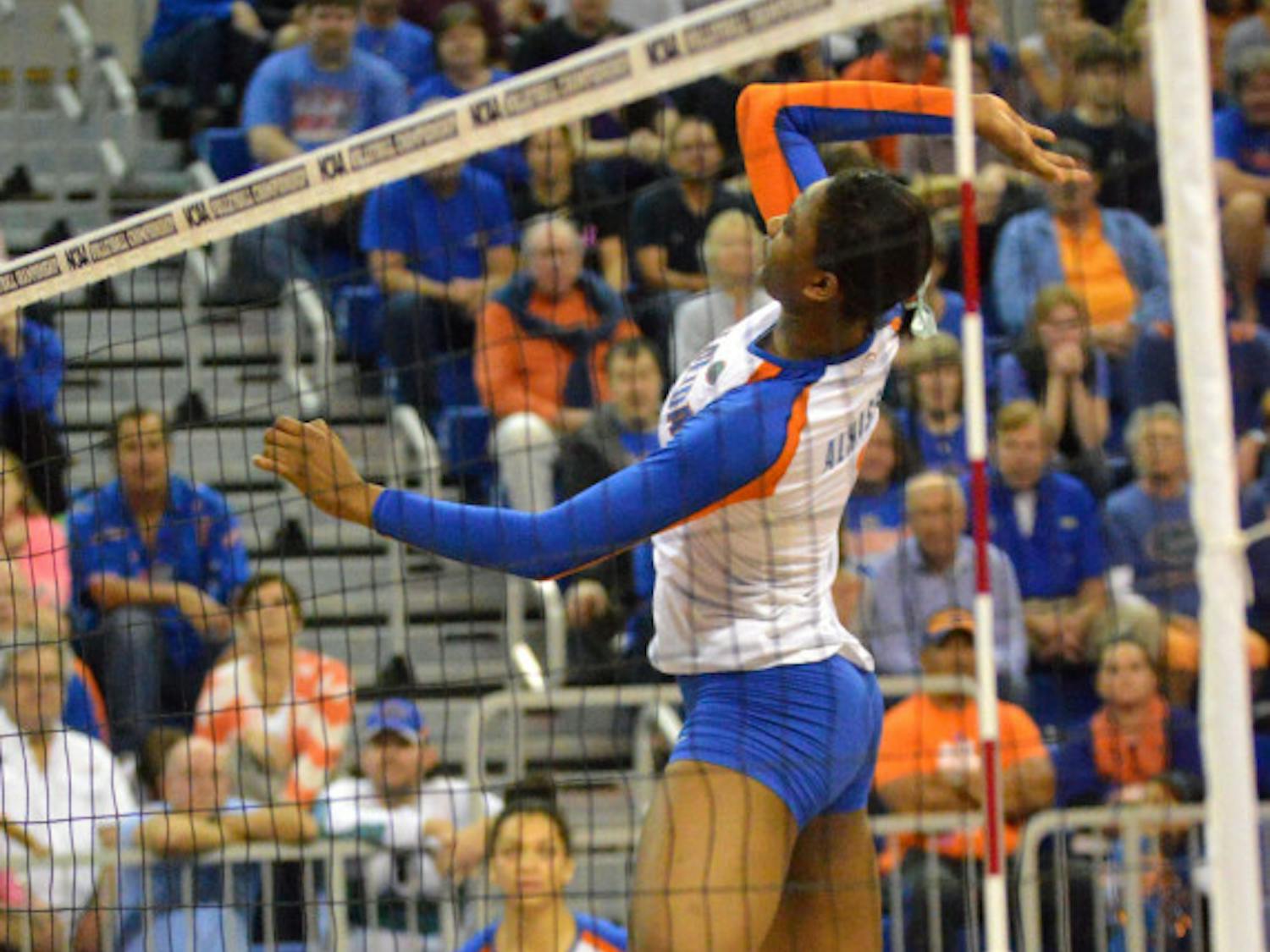 Rhamat Alhassan swings for a kill attempt during Florida's 3-0 win against Alabama State in the first round of the NCAA Tournament on Dec. 5 in the O'Connell Center.