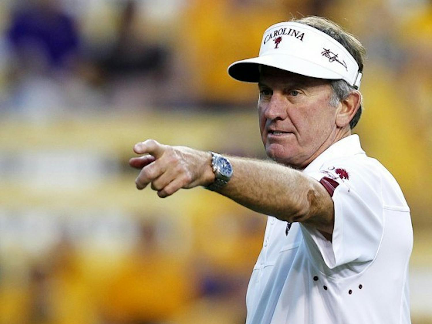South Carolina coach Steve Spurrier calls out to his team before its NCAA college football game against LSU in Baton Rouge, La., Saturday, Oct. 13, 2012. (AP Photo/Gerald Herbert)