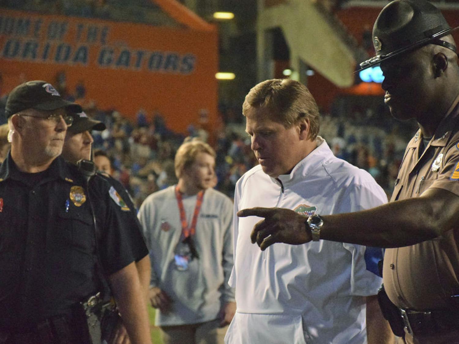 UF Jim McElwain walks off the field following Florida's 27-2 loss to Florida State on Nov. 28, 2015, at Ben Hill Griffin Stadium.