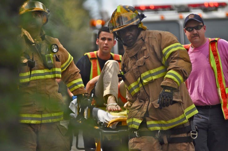 A tree tipped over and landed on West University Avenue, blocking eastbound and westbound traffic for about three hours. A Gainesville Fire Rescue crew freed a 30-year-old woman trapped in the car and rushed her to Shands at UF.