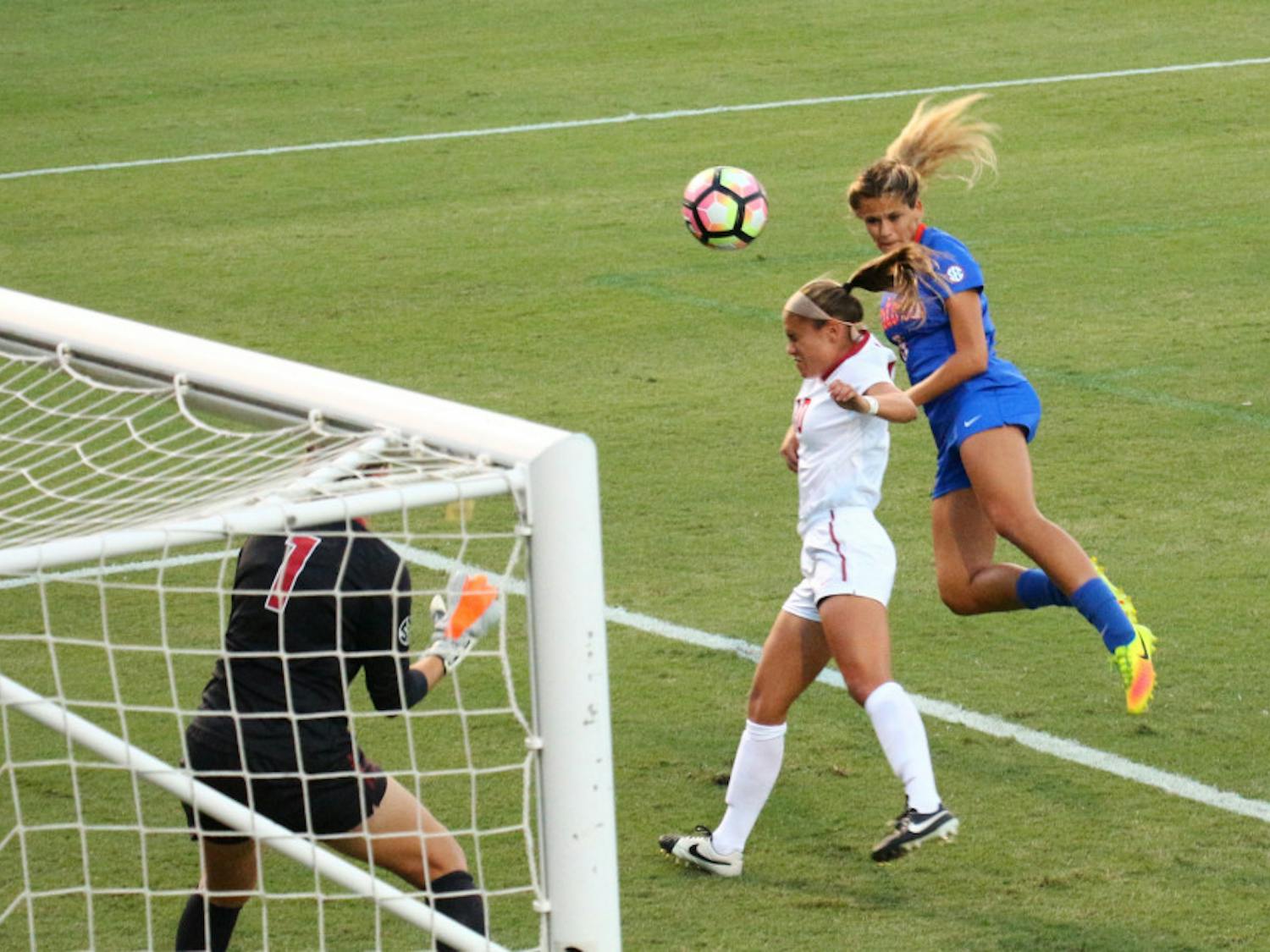 Melanie Monteagudo (far right) heads the ball into the net during Florida's 6-0 win over Alabama on Oct. 20, 2016, at Donald R. Dizney Stadium.