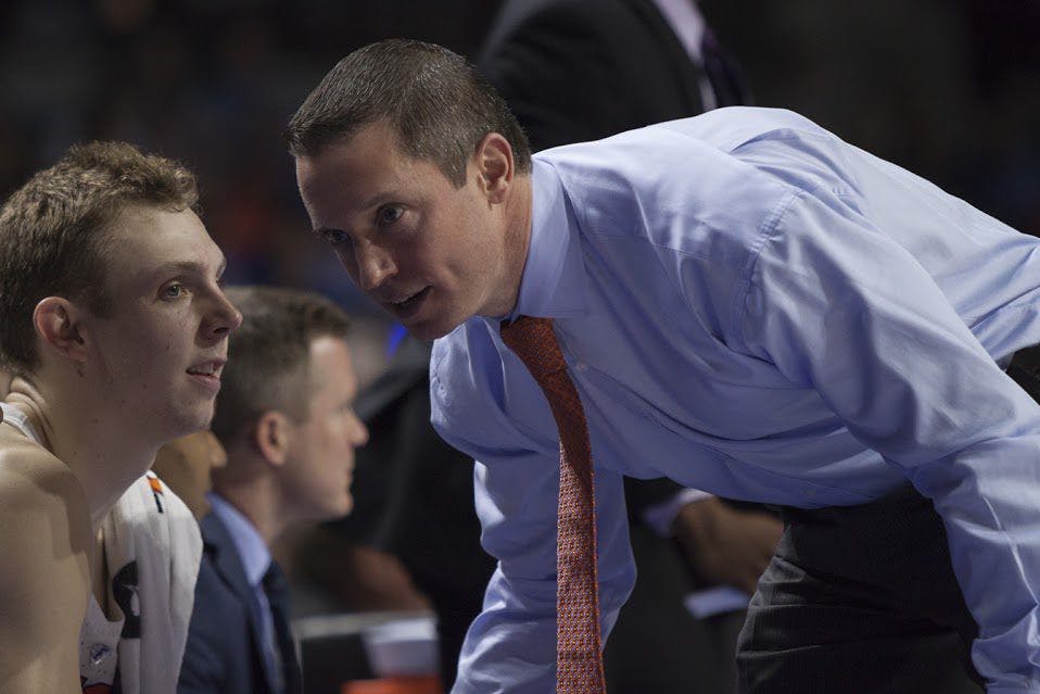 UF coach Mike White speaks with guard Canyon Barry during Florida's 71-62 win against Texas A&amp;M on Feb. 11, 2017, in the O'Connell Center.