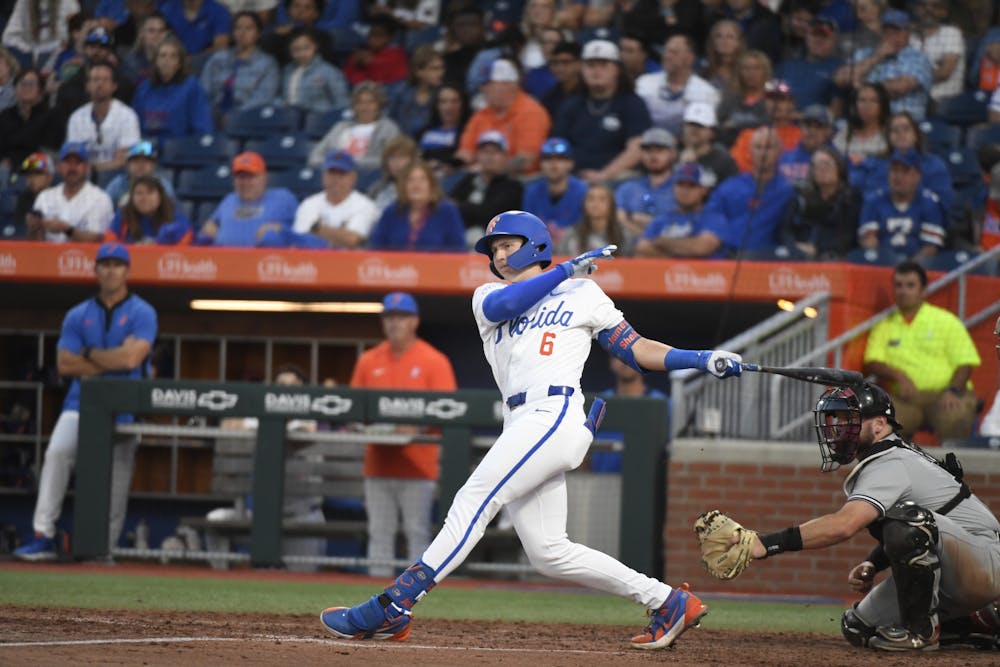 Florida baseball left fielder Tyler Shelnut swings the bat in the team's loss to the South Carolina Gamecocks on Friday, April 12, 2024. 