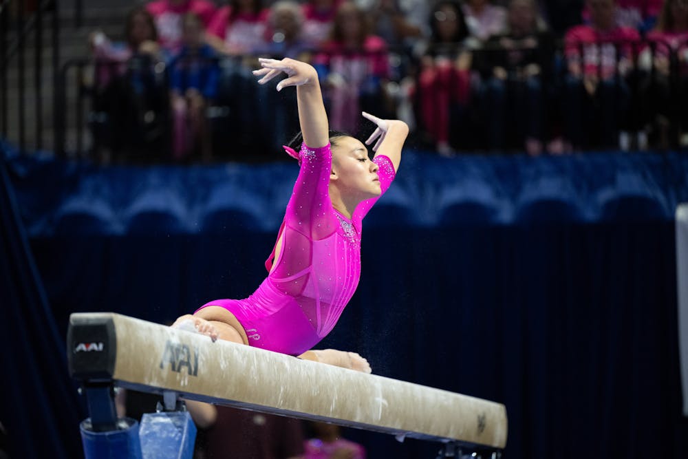 Florida Gators gymnast Leanne Wong preforms on the balance beam in a gymnastics meet against Auburn University in Gainesville, Fla., on Friday, Feb. 14, 2025.