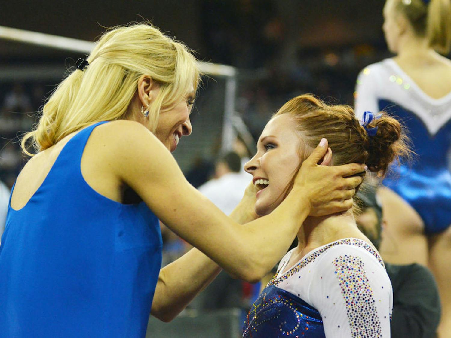UF coach Rhonda Faehn (left) celebrates with Bridget Sloan during the 2015 Southeastern Conference Championships on March 21 in Duluth, Georgia.