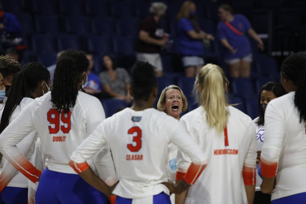 Florida coach Mary Wise talks to her team during a Sept. 24 game against Miss. State.