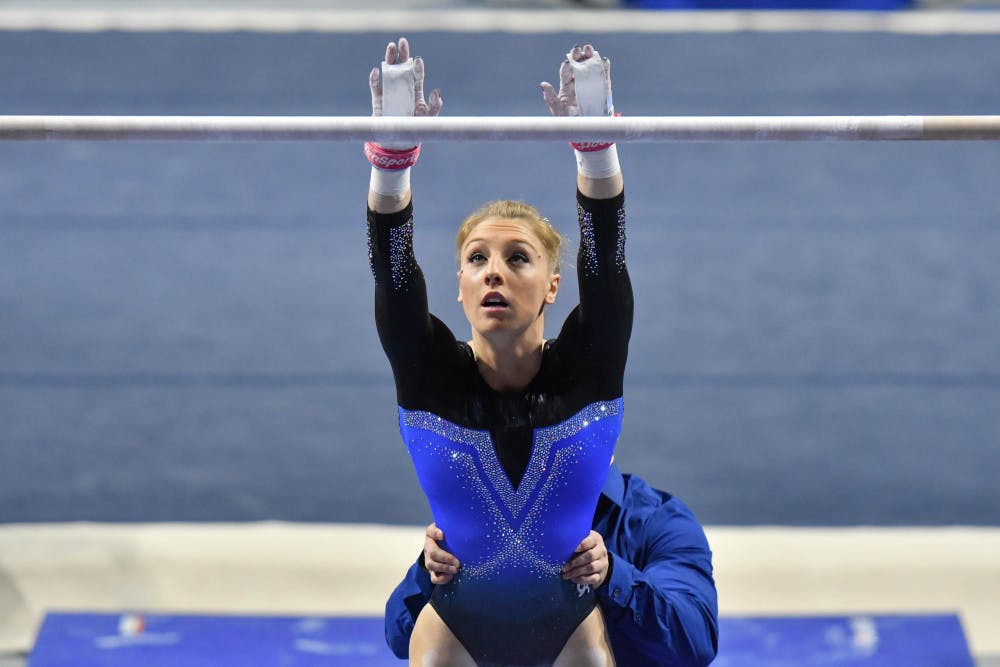 Florida gymnast Alex McMurtry sets up on the bars during Florida's win over Missouri on Feb. 24. 
