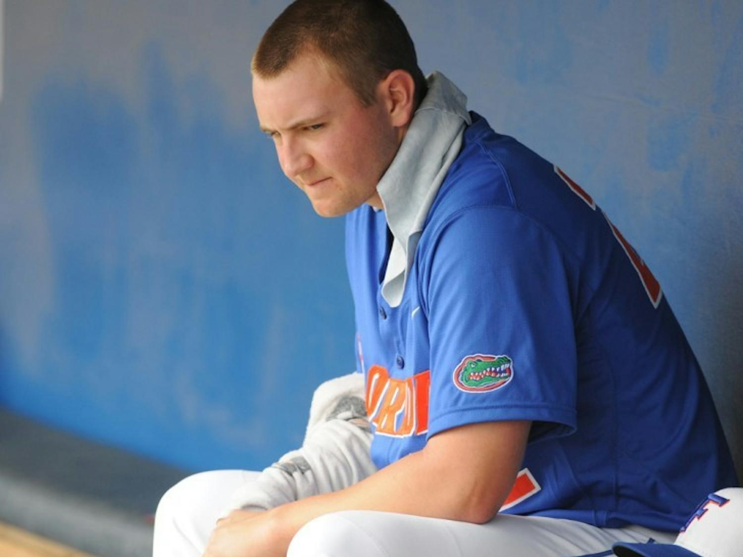 Starter Karsten Whitson sits in the Gators’ dugout following a game against USF last season. Whitson has not pitched since an abbreviated outing on Feb. 26.