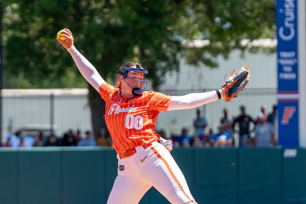 Florida freshman right-handed pitcher Ava Brown pitches the ball in the team's 4-3 loss against the LSU Tigers on Sunday, April 7, 2024. 