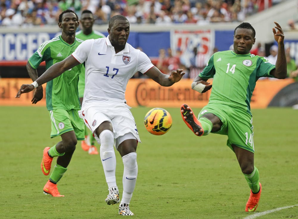 United States' Jozy Altidore (17) and Nigeria's GoDrey Oboabona (14) vie for control of the ball during the second half of an international friendly soccer match on Saturday in Jacksonville, Fla. The United States won 2-1.