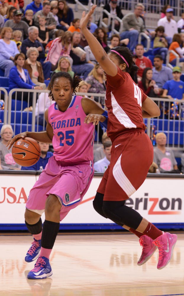 Christin Mercer (25) drives the lane in UF’s 87-54 win against Alabama on Feb. 3. Coach Amanda Butler has identified Mercer as an important post player for the Gators.
