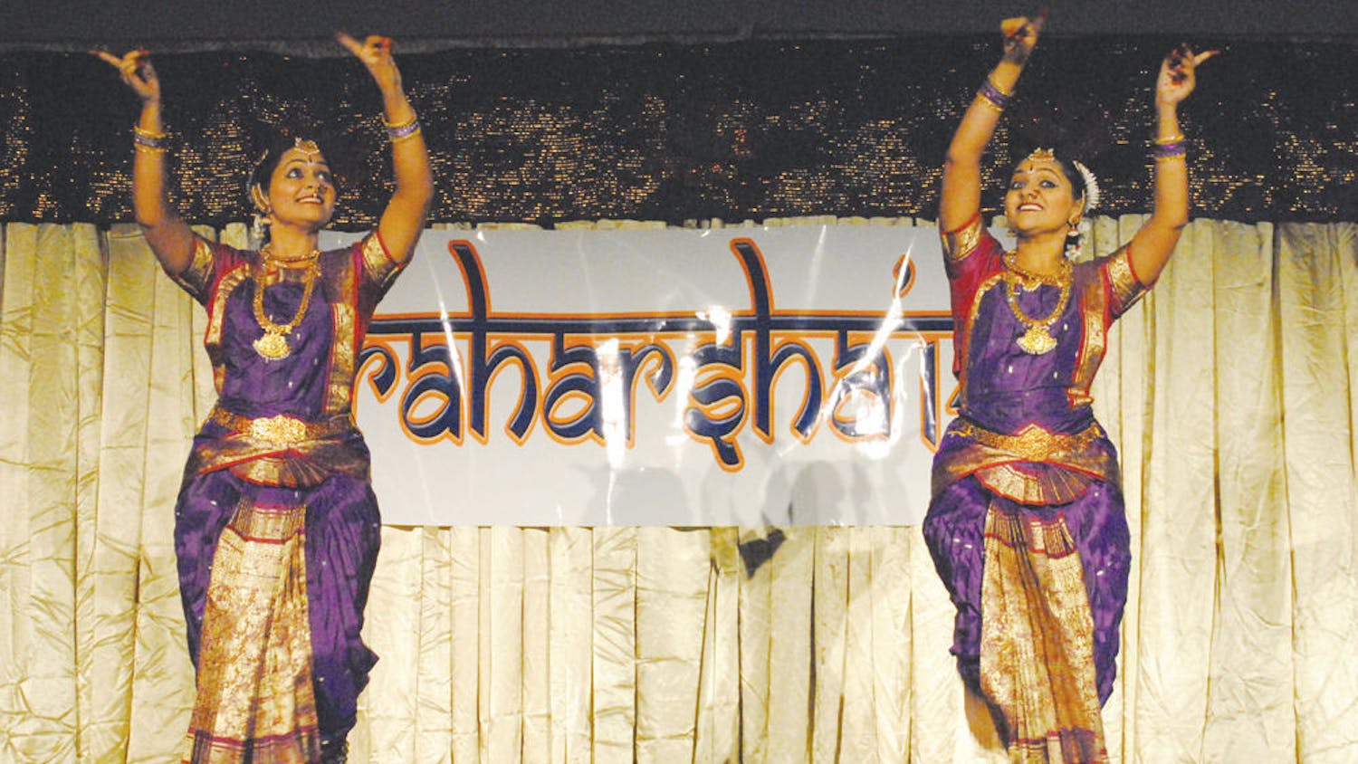 UF biology sophomores Jayash and Manash Ram, both 19,&nbsp; perform a Bharatanatyam dance at Praharsha, the festival of hope and happiness, at the Reitz Union Ballroom on Saturday.