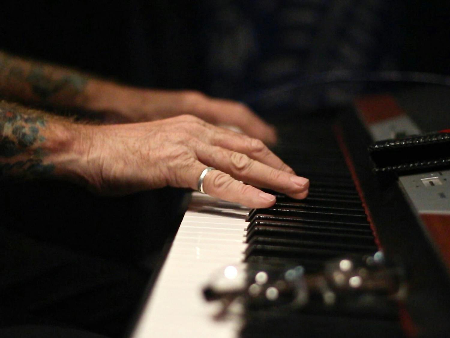 Rev. Billy C. Wirtz, a 62-year-old typically solo pianist, Tampa DJ and Ocala resident, warms up on his keyboard for Willie Green’s band performance in the Phillips Center’s Squitieri Studio Theatre on Wednesday before his performance today. Wirtz said blues was considered “devil music.” “Gospel says no matter how bad things get, with a little bit of hope, things will get better,” he said, while “blues says don’t count on it.”