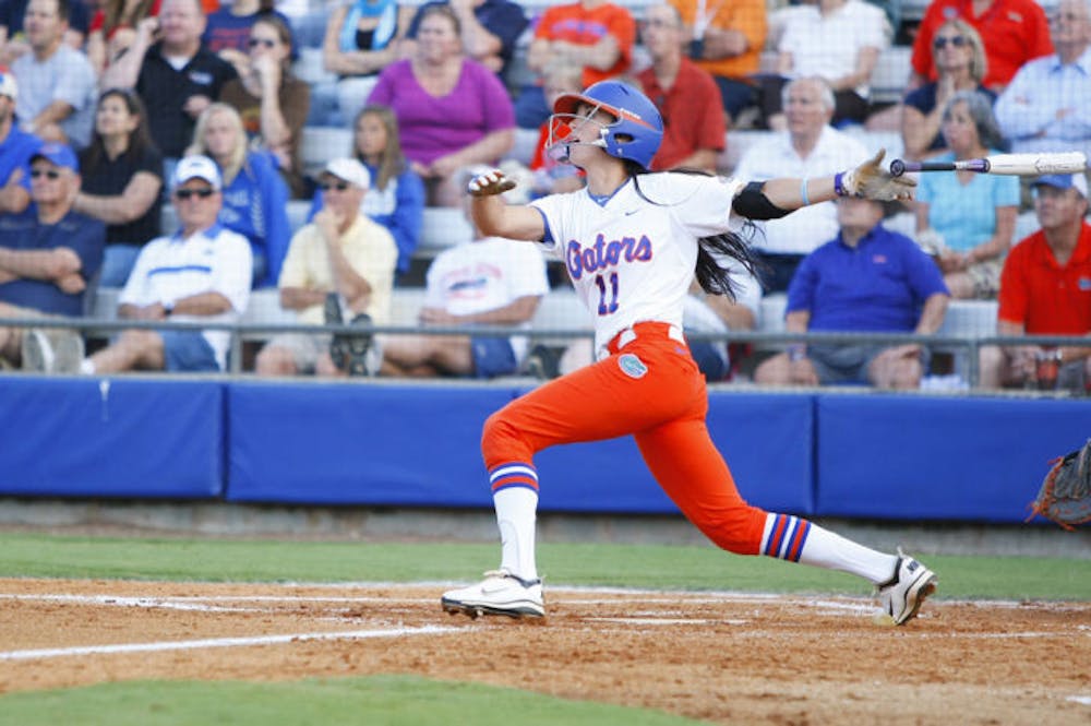 <p><span>Senior Ensley Gammel (11)&nbsp; watches a fly ball off her bat during Florida’s 3-2 win against Auburn on April 13, 2012 at Katie Seashole Pressly Stadium. Gammel homered in a 14-3 win against Arizona on Sunday at the Kajikawa Classic.</span></p>
<div><span><br /></span></div>