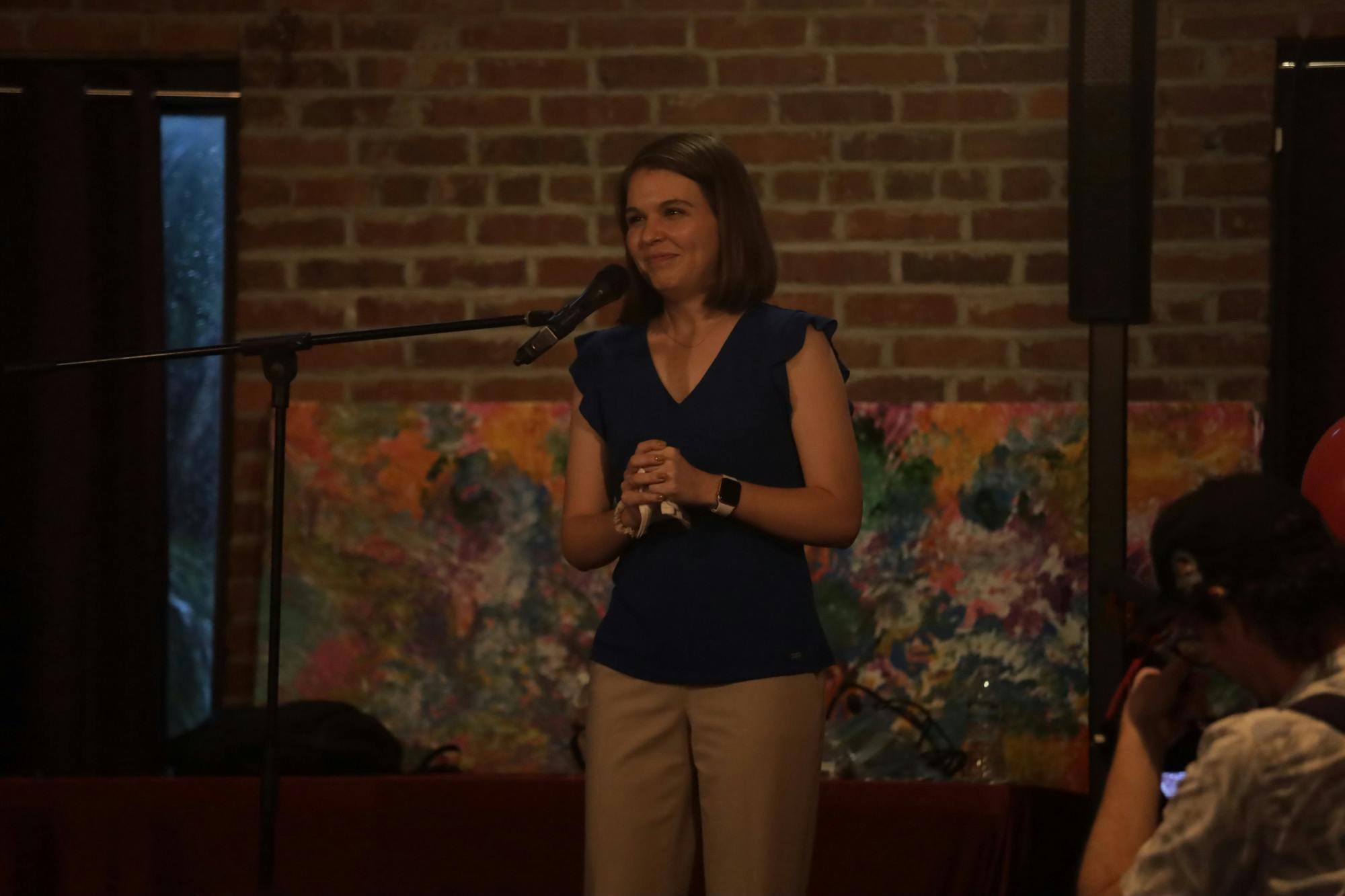 Danielle Hawk smiles at her supporters at her watch party Tuesday, Aug. 23, 2022. 