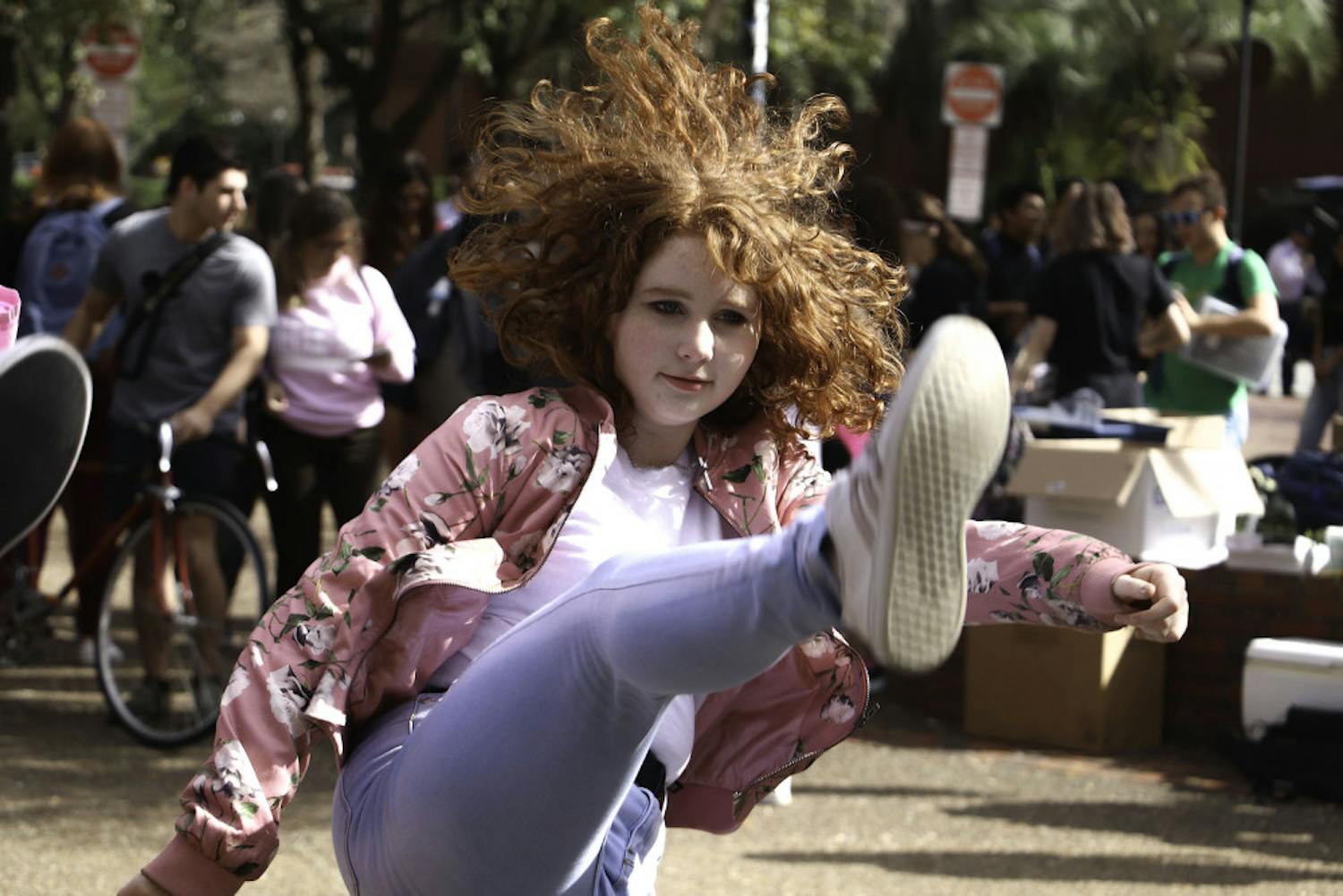 Genesis Dance Crew, UF's first K-pop cover group, performs in Turlington Plaza on Wednesday afternoon.