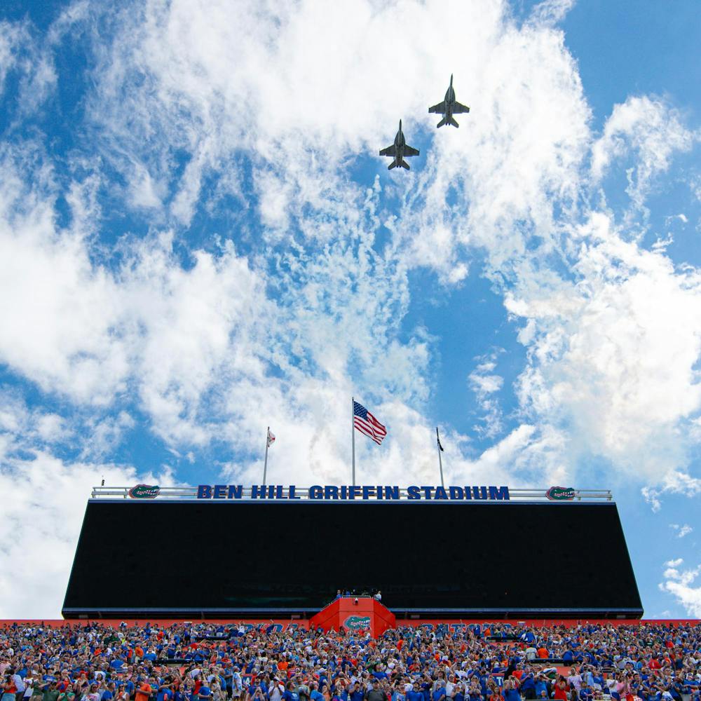 Two F-18 Hornets fly over Ben Hill Griffin Stadium before kickoff of a football game between the South Florida Bulls and the Florida Gators on Sept. 6, 2025, in Gainesville, Fla.