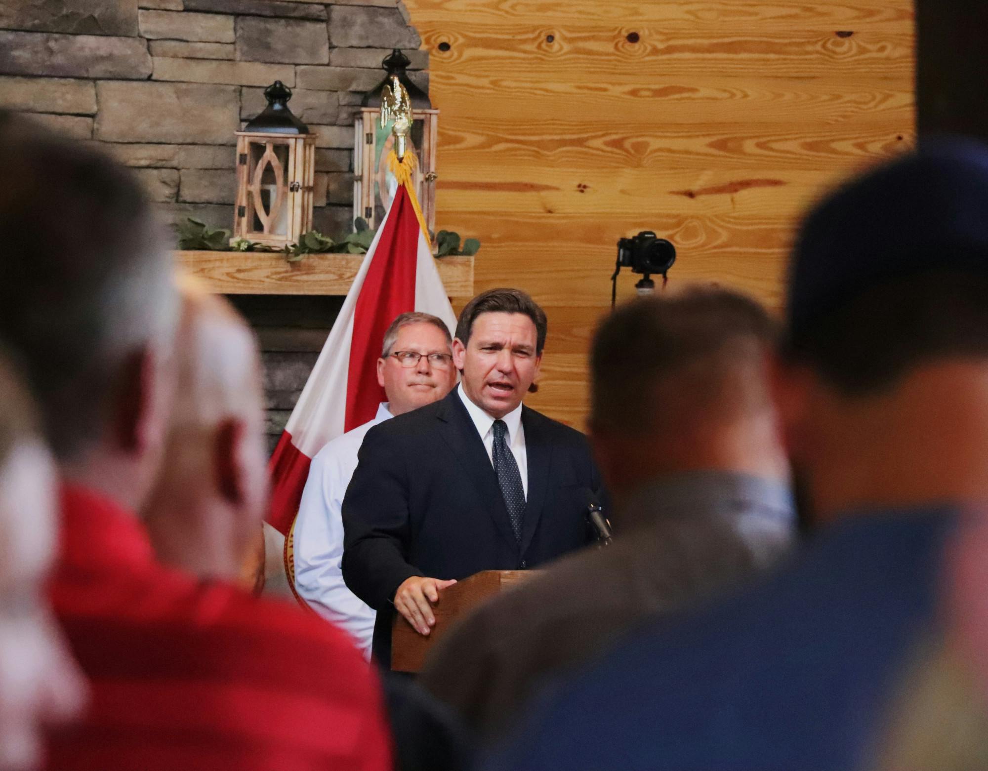 Gov. Ron DeSantis addresses a crowd at Clark Plantation Wedding Venue in Newberry, Florida, on Monday, Sept. 13, 2021. 