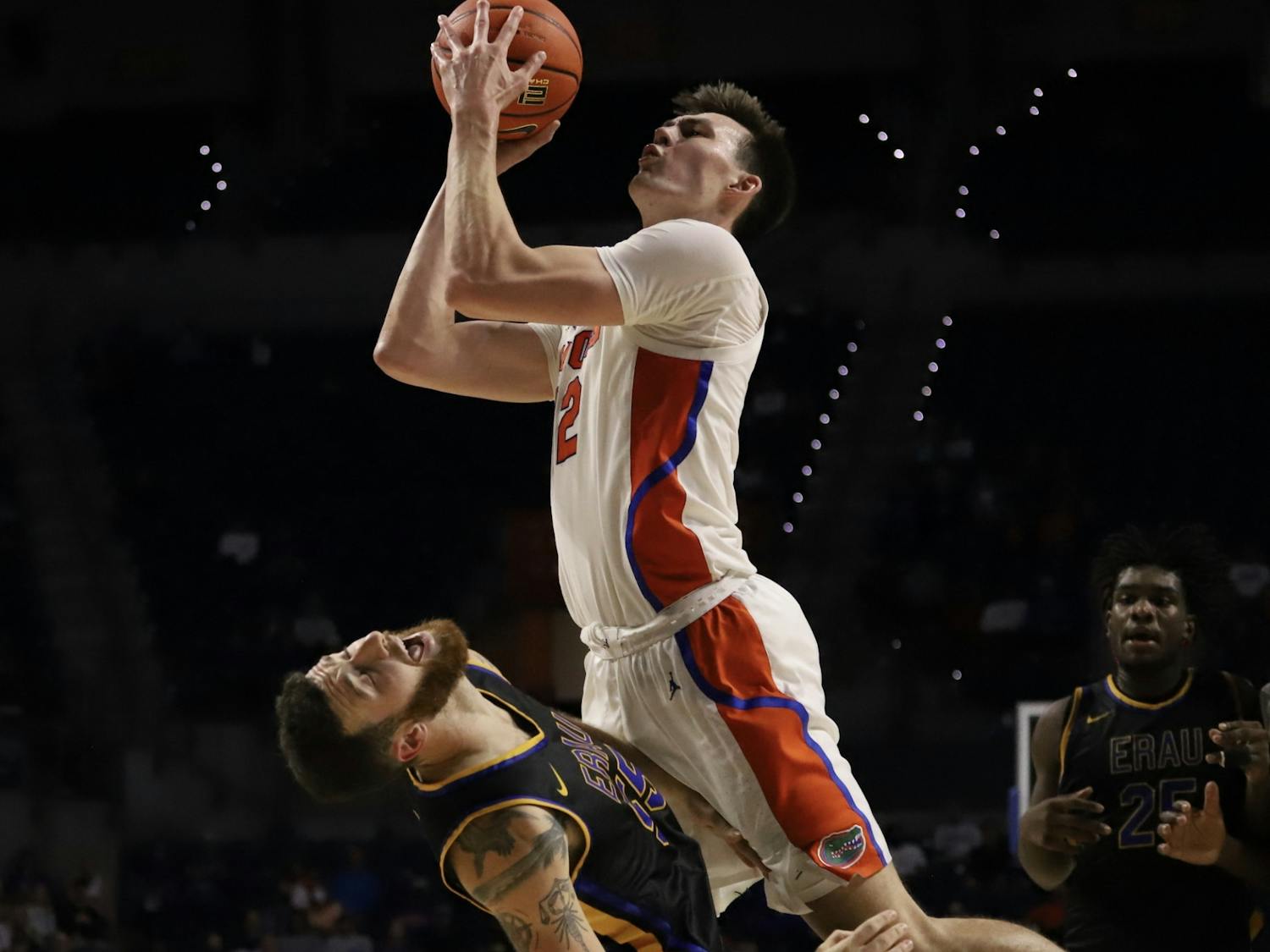 Florida's Colin Castleton, pictured in white, plays during an exhibition game against Embry-Riddle on Nov. 2.