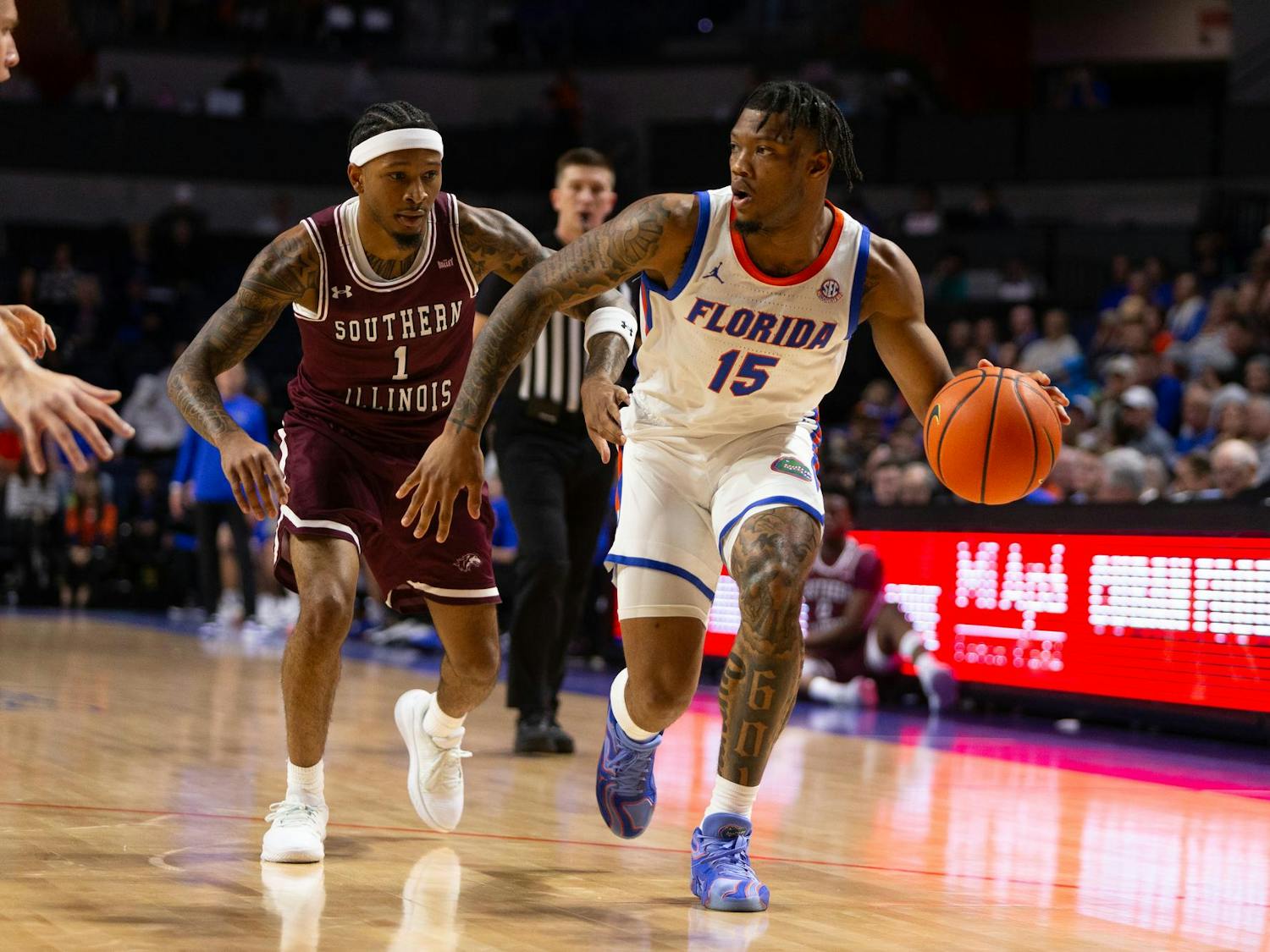 Florida Gators Guard Alijah Martin (15) drives towards the baseline during the first half against the Southern Illinois University Salukis at Exactech Arena at the Stephen C. O'Connell Center. on Friday, Nov. 22, 2024.